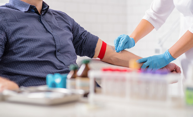 Man having a blood test in Bexley and Medway.