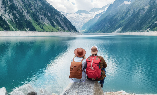 Two International Travelers Sitting Together.